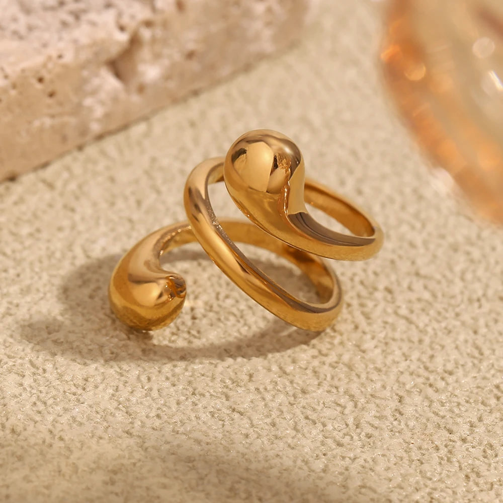 Anel Espiral Dourado com Zircônia