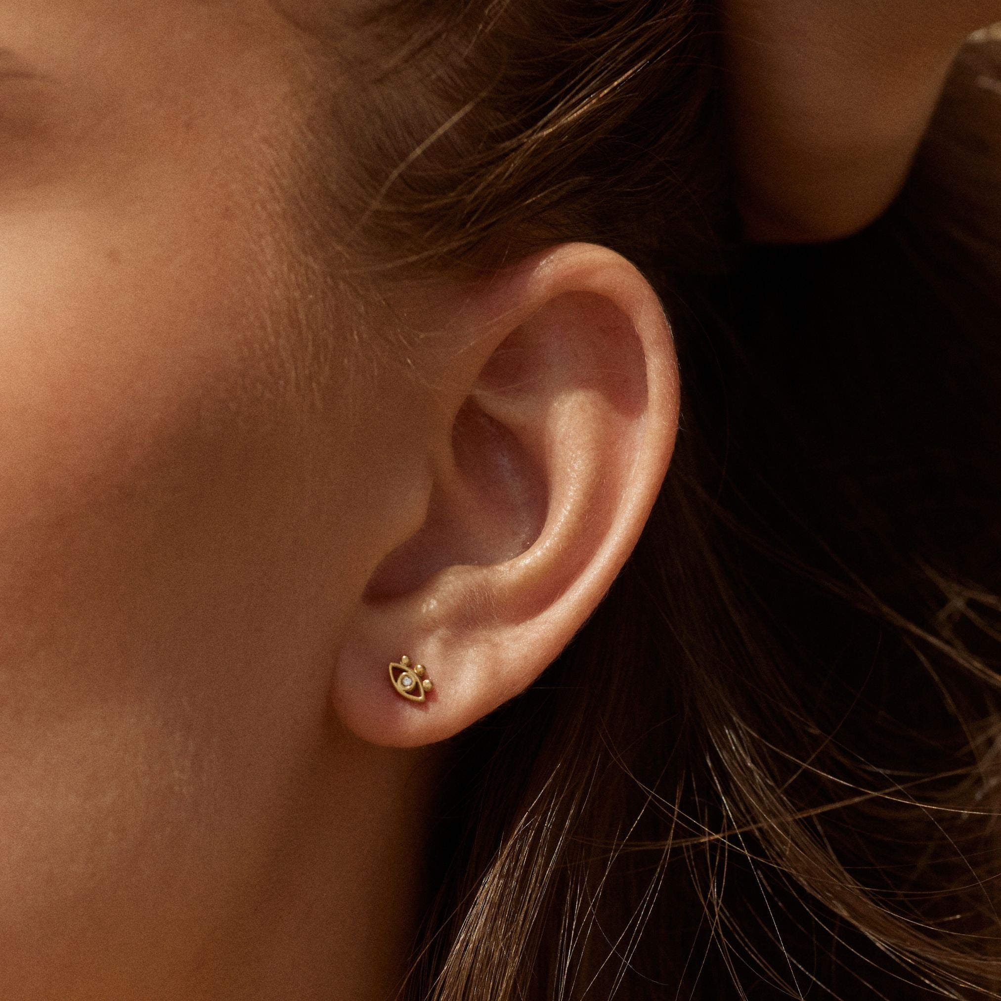 gold-evil-eye-studs.jpg